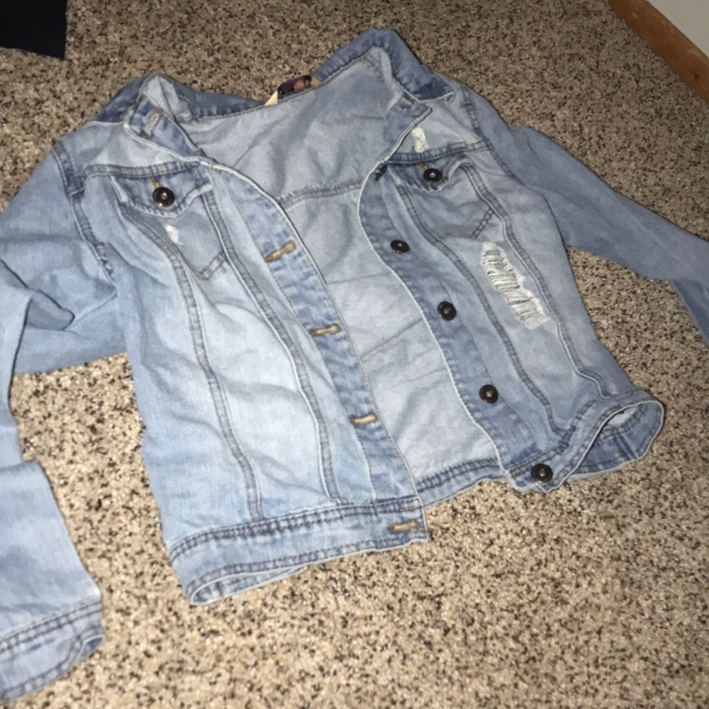 blue ripped denim jacket